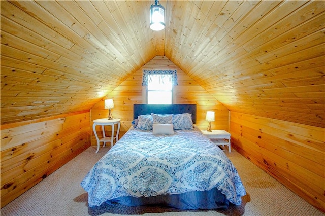 bedroom with lofted ceiling, wood ceiling, wooden walls, and carpet floors