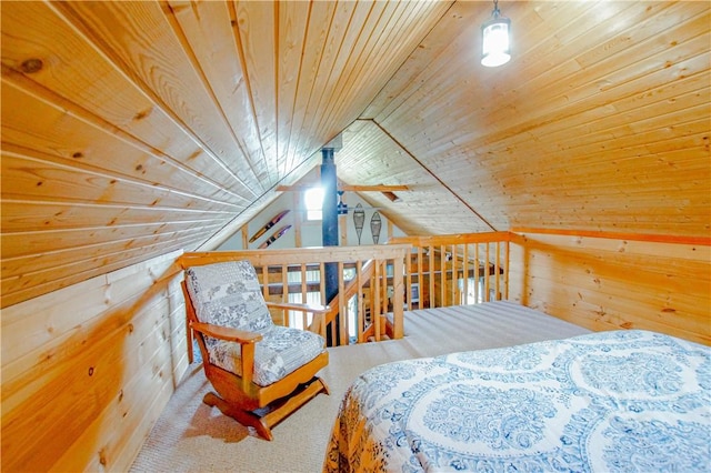 carpeted bedroom featuring wood ceiling, wooden walls, and vaulted ceiling