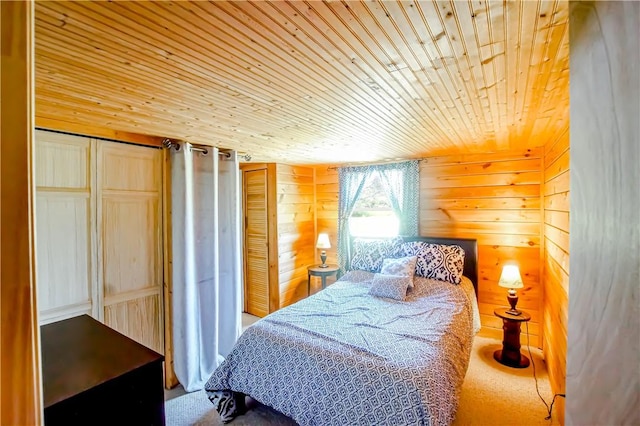 bedroom with wooden ceiling and wood walls