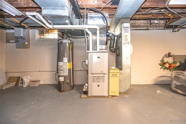 utility room featuring heating unit and gas water heater