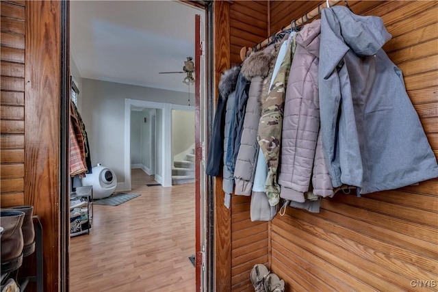 interior space featuring a ceiling fan and wood finished floors