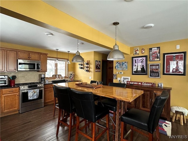 dining room with dark wood-type flooring