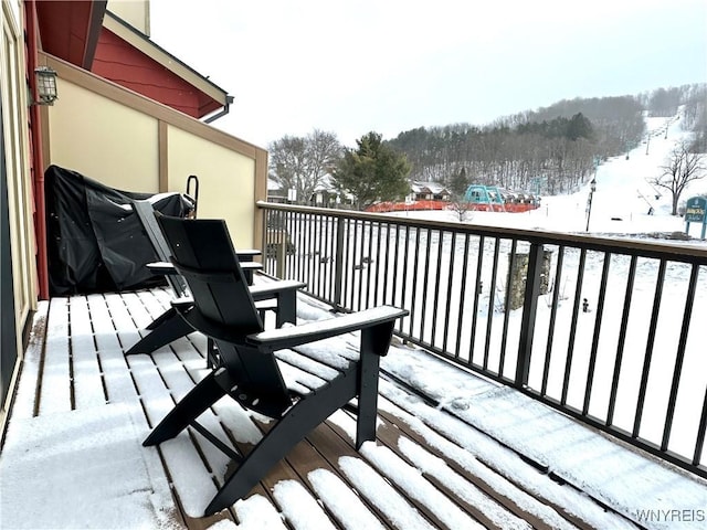 view of snow covered deck