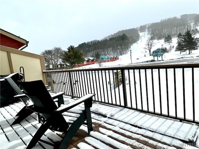 view of snow covered deck