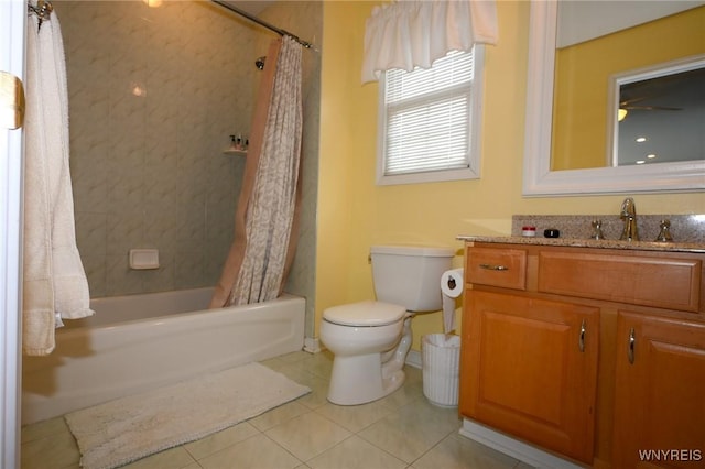 full bathroom featuring vanity, shower / bathtub combination with curtain, toilet, and tile patterned floors