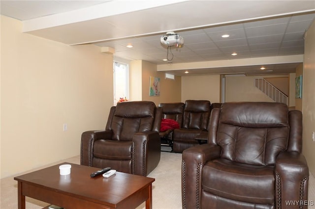 home theater room with light carpet and recessed lighting