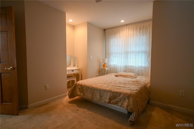 bedroom with recessed lighting, carpet flooring, and baseboards