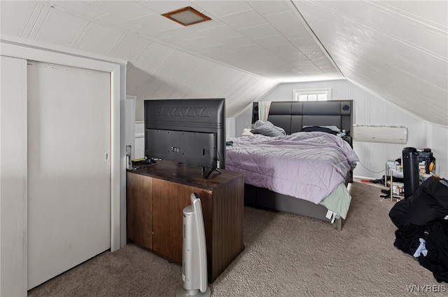 carpeted bedroom featuring lofted ceiling