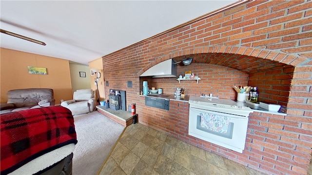 living room with brick wall