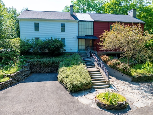 view of front of house with a chimney