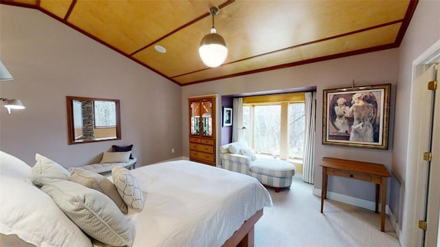 bedroom featuring light carpet and vaulted ceiling