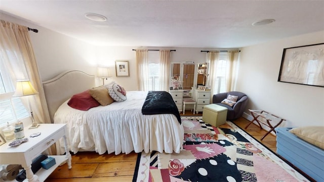 bedroom with wood finished floors