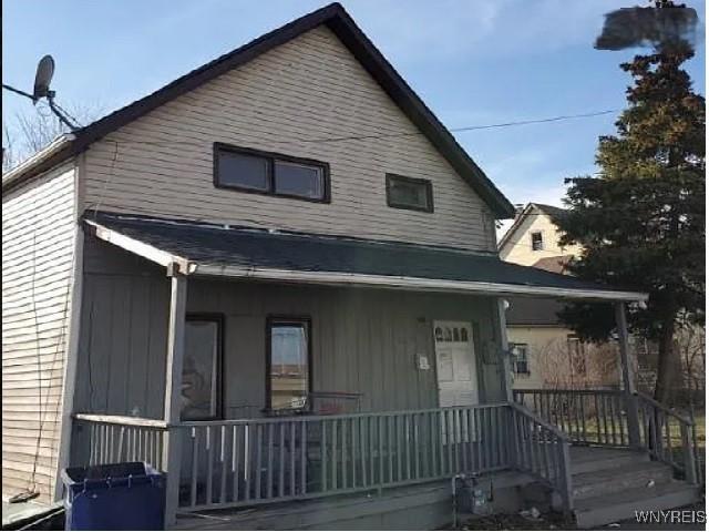 back of house with covered porch