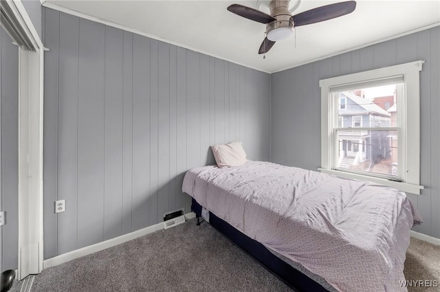 bedroom featuring carpet floors, ceiling fan, and baseboards