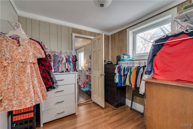 spacious closet featuring light wood-type flooring