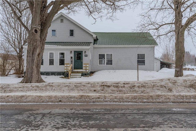 view of front of house featuring metal roof