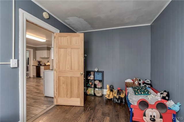 rec room with crown molding and wood finished floors