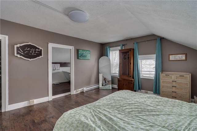 bedroom featuring baseboard heating, vaulted ceiling, a textured ceiling, wood finished floors, and baseboards