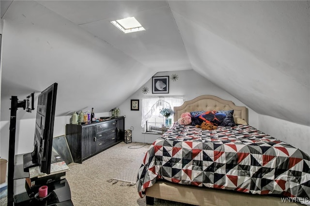 carpeted bedroom with lofted ceiling