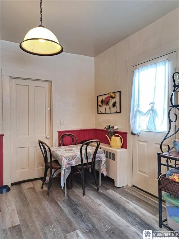 dining room with wood finished floors