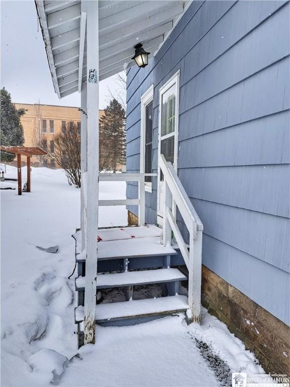 view of snow covered deck