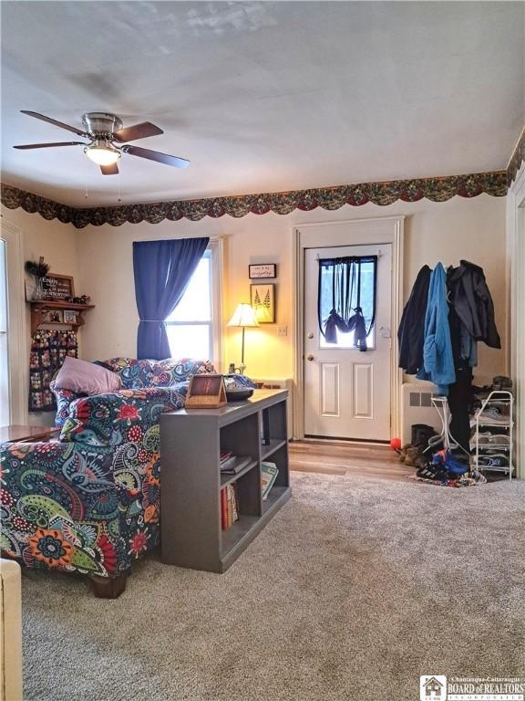 bedroom featuring a ceiling fan and carpet flooring