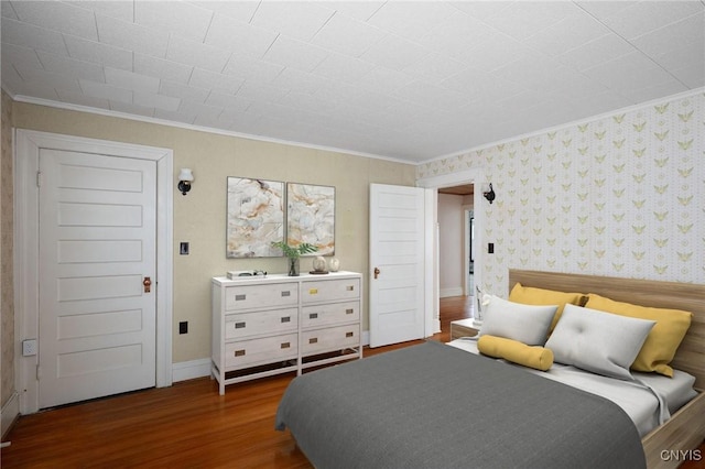 bedroom with wallpapered walls, crown molding, baseboards, and wood finished floors