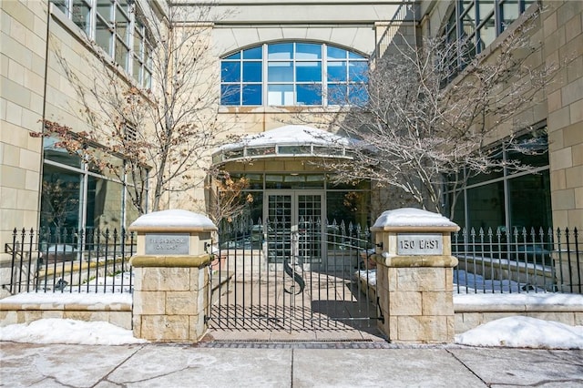 view of gate with fence