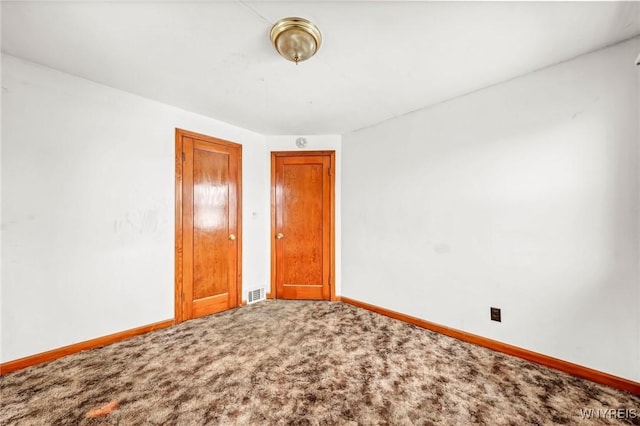 interior space with visible vents and baseboards