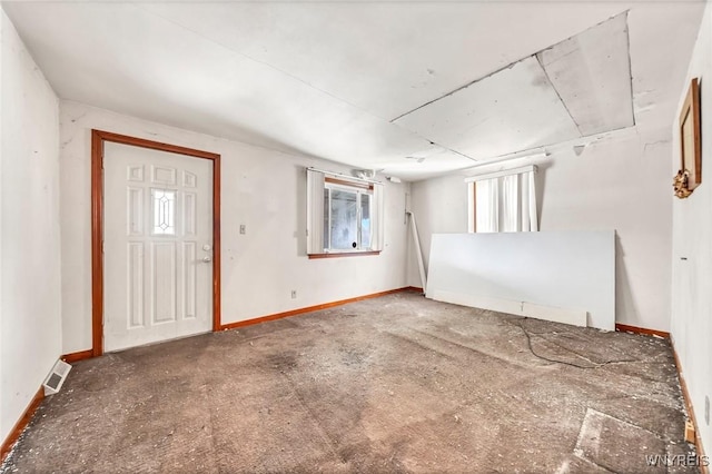 interior space with visible vents and baseboards