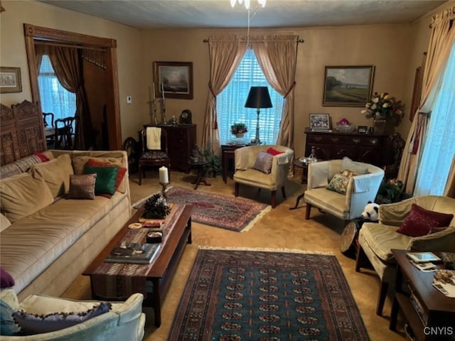 carpeted living room featuring a wealth of natural light