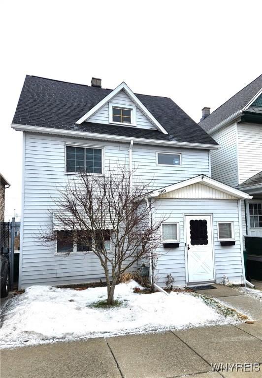 view of front of home with a chimney