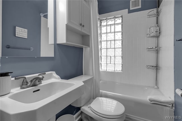 full bath with shower / washtub combination, visible vents, a sink, and toilet