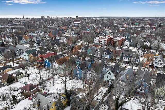 birds eye view of property with a residential view