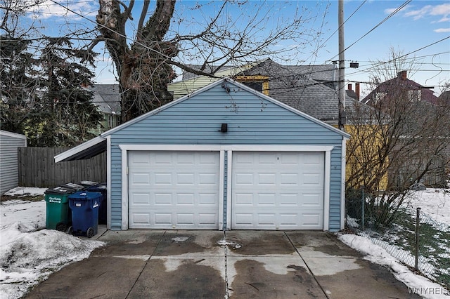 detached garage with fence