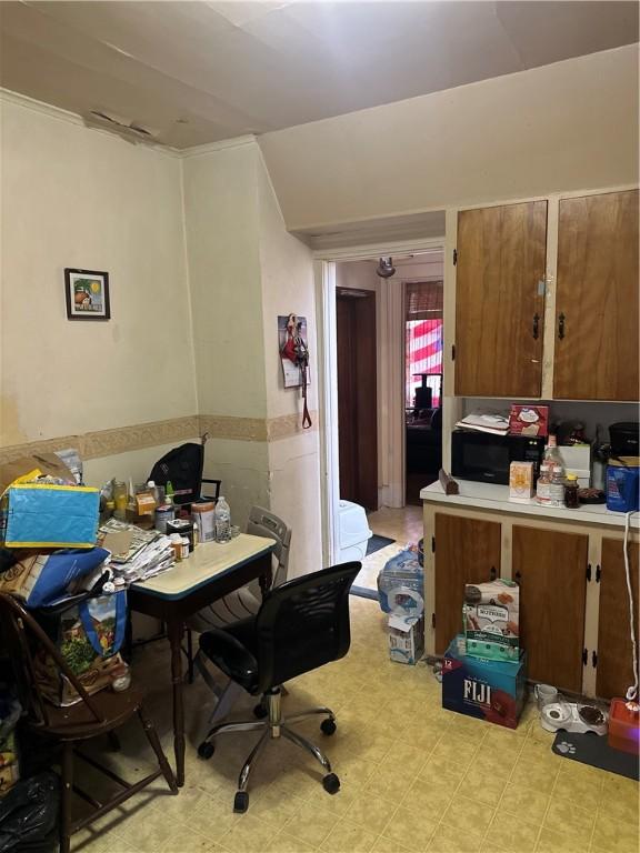 office area featuring wainscoting