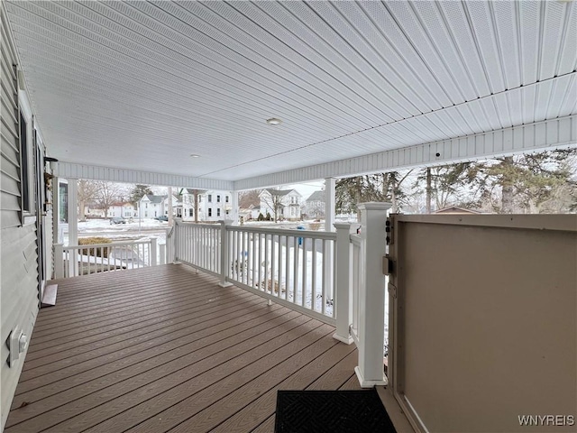 wooden terrace featuring a residential view