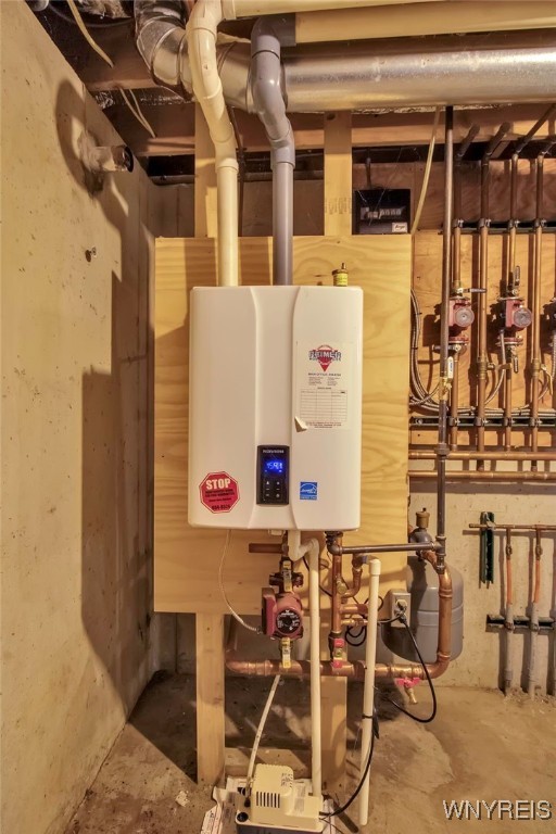 utility room with water heater