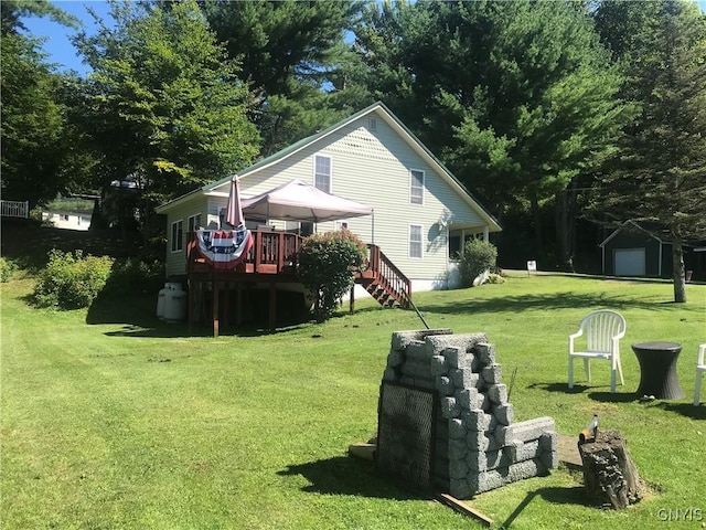 view of yard featuring stairway and a wooden deck