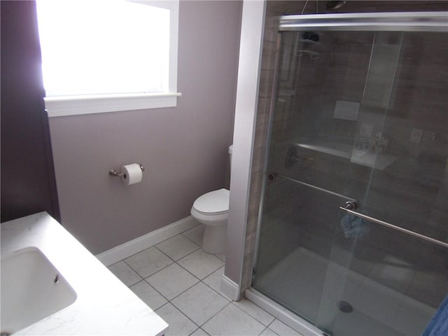 full bathroom featuring toilet, a shower stall, and tile patterned floors