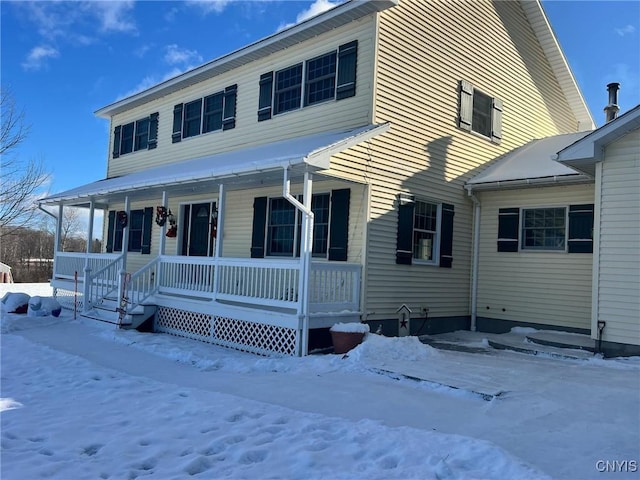 view of front of home featuring covered porch