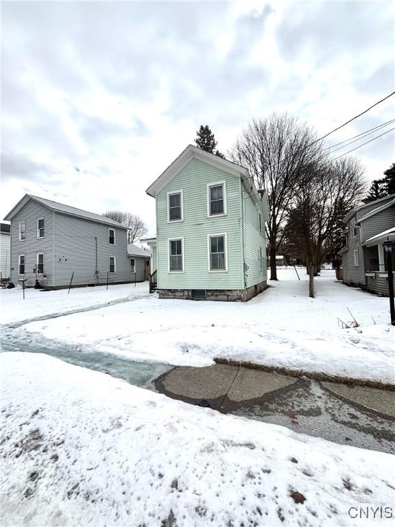 view of snow covered property