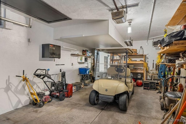 garage featuring a workshop area and a garage door opener