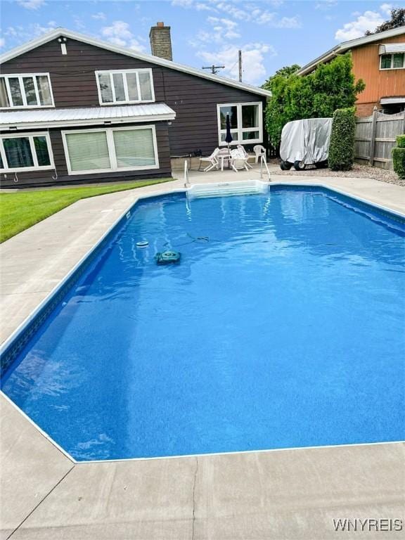 view of pool featuring a patio, fence, and a fenced in pool