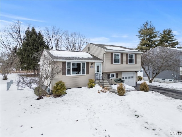 tri-level home with an attached garage