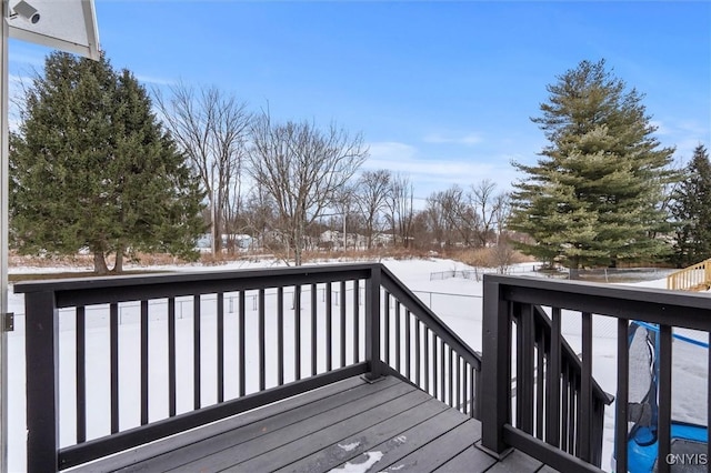 view of snow covered deck