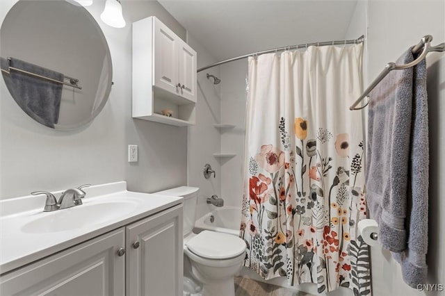 full bathroom with toilet, shower / bath combo, and vanity