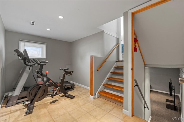 workout area featuring recessed lighting, visible vents, and baseboards