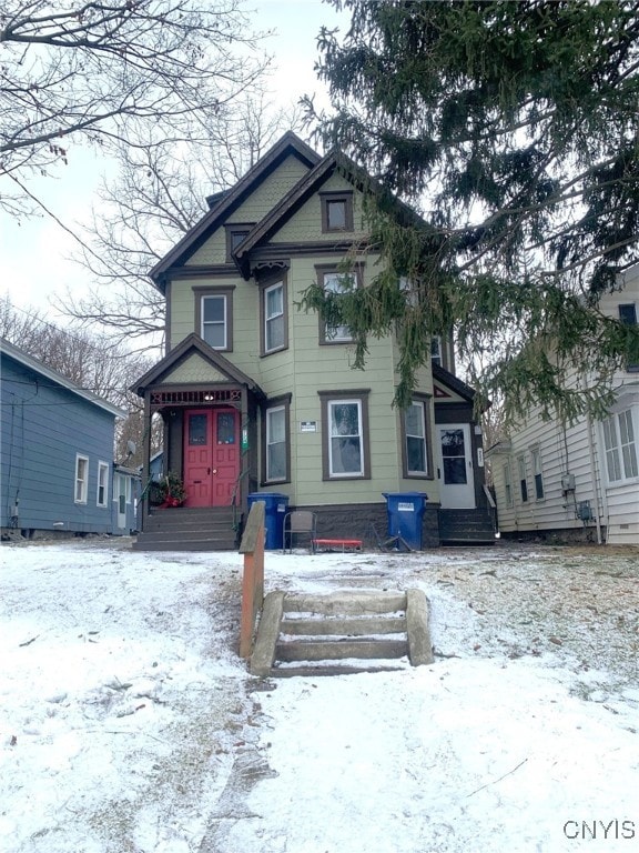 victorian-style house with entry steps