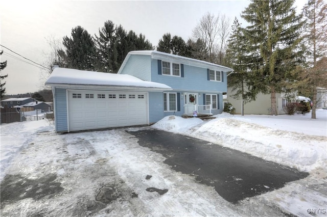 view of front of house featuring a garage and driveway